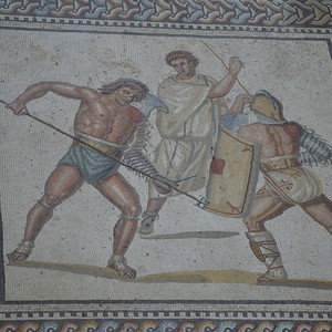 Battle of retiarius against secutor. Mosaic of gladiators in a Roman villa in Nennig, Germany. Early 3rd century AD
