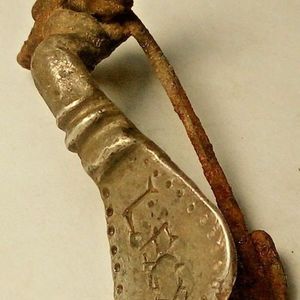 Brooch attributed to the Tenth Legion; reported material: silver. Private collection. Archaeological provenance, dating and legionary attribution are not established by the documentation provided.