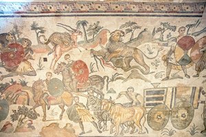 Auxiliaries that hunt wild animals. IV century AD Roman mosaic from the Villa del Casale near Piazza Armerina (Sicily)
