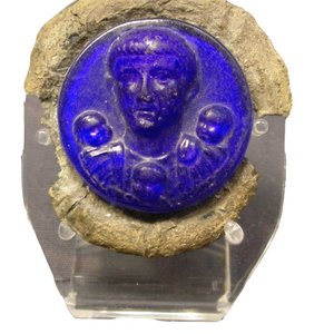 Glass portrait disc identified as Germanicus. British Museum; attributed to the first–third century CE. Identification as a phalera is interpretative.