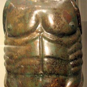 Lorica musculata. Lanuvium's warrior tomb. Bronze, there are traces of leather and linen. Maximum height: 40.8 cm, shoulders 50 cm, width: 30 cm, overall thickness: 26 cm. 490-480 year BCE