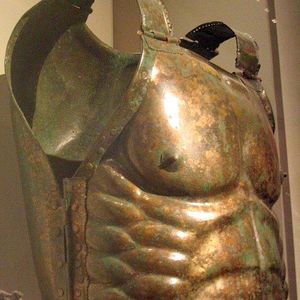 Lorica musculata. Lanuvium's warrior tomb. Bronze, there are traces of leather and linen. Maximum height: 40.8 cm, shoulders 50 cm, width: 30 cm, overall thickness: 26 cm. 490-480 year BCE