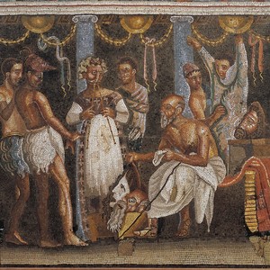 Actors preparing for a satyr play. Mosaic from the House of the Tragic Poet at Pompeii, 69–79 CE; Naples, National Archaeological Museum, inv. 9986. Masks, costume, danced movement and a double-pipe player turn a lost performance into a carefully organised image.