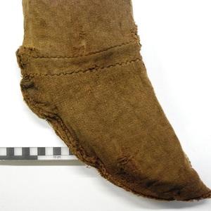 Detail of the enclosed foot of Thorsberg trousers, third–fourth century CE; not a separate modern sock.