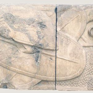 Frieze with Galatian trophies from the propylon of the Pergamon Library. It shows characteristic Galatian shields,chain mail,spears and a signal trumpet with a bell shaped like a bull's head. Pergamon Museum,Berlin. 2nd century BC
