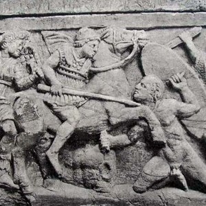An Italian horseman strikes a Gallic infantryman with a spear. Relief of the Etruscan sarcophagus from Chiusi. 3rd century BC