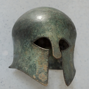 Corinthian helmet. Bronze,first quarter of the VI century BC,Department of Greek,Etruscan and Roman Antiquities,Sully-sur-Loire.