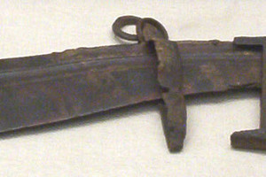 Falcata with the remains of a scabbard. A museum in Madrid. 3rd century BC
