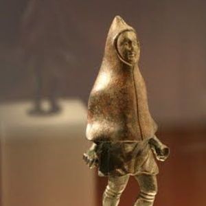 Bronze figurine of a man wearing a hooded cape, from the Treveran region; archaeological collection in Trier, Germany.