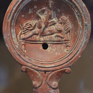 Oil lamp with erotic scene. Romano-Germanic Museum,Cologne. 1-2 century AD