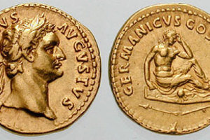 Gold Roman coin (aureus) of the Emperor Domitian (81-96 AD). The reverse side shows a captured German on a shield.