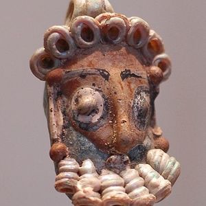 Стеклянная голова, Карфаген. Хранится в Лувре. 3-4 век до н.э.