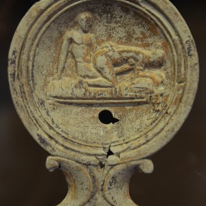 Oil lamp with erotic scene. Romano-Germanic Museum,Cologne. 1-2 century AD