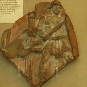 Terracotta bas-relief with a venator or bestiary. The British Museum. 1-2 century AD