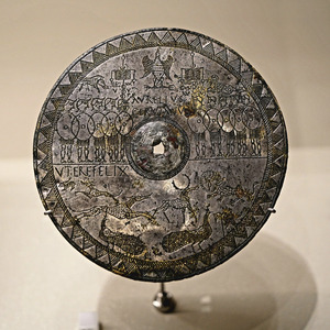 Bronze roundel of Aurelius Cervianus, showing an eagle, vexilla and legionary emblems; third century CE. Musée de la BnF, Paris, bronze.1363. Provenance unknown, probably Continental; RIB 2427.26* excludes a find in Roman Britain.