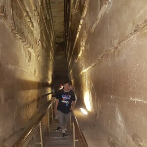 Interior passage of the Great Pyramid: narrow corridors linked entrance, gallery and chambers.