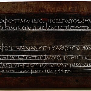 Wax tablet with a Greek school exercise: model lines and a pupil's copies. Egypt, second century AD; British Library, Add MS 34186.
