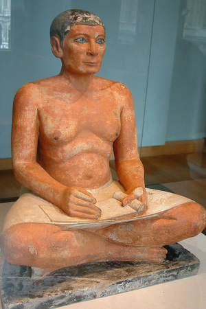 The Seated Scribe from Saqqara. Painted limestone, Dynasty 4-5, c. 2600-2350 BC; Louvre, E 3023.
