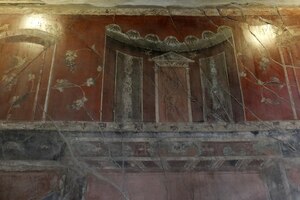 House of the Wooden Partition at Herculaneum: atrium, impluvium and the preserved carbonised partition of the tablinum. Herculaneum, AD 79;.