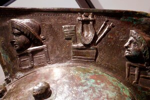 Detail of a bronze murmillo helmet from Pompeii, found in the portico area later associated with the gladiators' barracks; MANN.