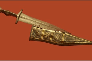Detail of a type II pugio scabbard with a solar motif; Roman military dagger, Early Empire.
