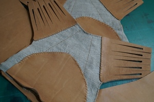 Cut upper parts before stitching.