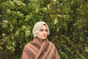 Reconstructed sprang cap in wear, front view.