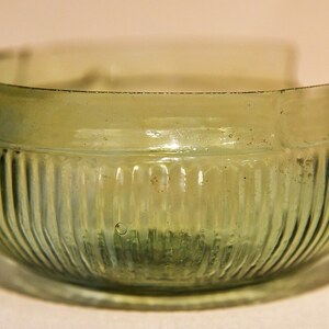 Isca Augusta / Caerleon: Caerleon, Roman Legionary Museum, Mid c1st AD mould-blown glass bowl - geograph.org.uk...; material-culture object or museum find connected with the site, Roman period or local archaeological context.