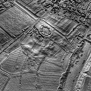 Isca Augusta / Caerleon: Roman amphitheatre at Caerleon and the surrounding archaeological features; archaeological view, find or museum context connected with the site, Roman period or local archaeological context.