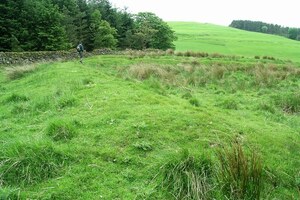 Projectiles,Ballistae,and Burnswark: Earthworks, Burnswark Hill - geograph.org.uk - 178739; archaeological view, find or museum context connected with the site, Roman period or local archaeological context.