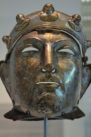 Неймеген / Noviomagus: The Nijmegen cavalry helmet, an iron mask sheathed in bronze and silver discovered in 1...; предмет материальной культуры или музейная находка, связанный с памятником, римский период или локальный археологический контекст.
