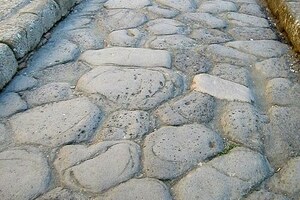 Herculaneum: Roman Road Surface at Herculaneum; archaeological view, find or museum context connected with the site, Roman period or local archaeological context.