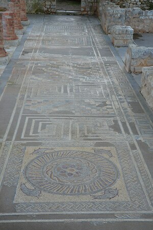 Conimbriga: Mosaic floor in the House of the Fountains with fish, geometric pattern and labyrinths,...; material-culture object or museum find connected with the site, Roman period or local archaeological context.