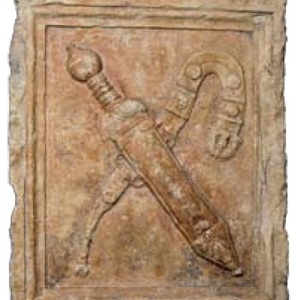 Tombstone relief showing a military belt and pugio. Archaeological Museum of Istria, Pula; inv. A-301. Third quarter of the first century CE.