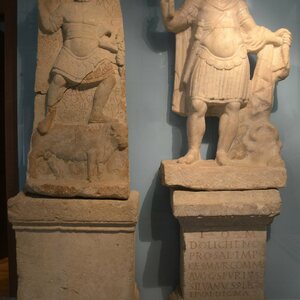 Limestone relief (left) and marble statue (right) of Jupiter Dolichenus, Antonine-Severan period, Carnuntum Archaeological Museum, Austria. Экспонат из собрания: Карнунт и Museum Carnuntinum.