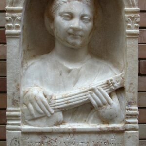 Funerary relief of Lutatia Lupata (Merida, MNAR CE8241). Экспонат из собрания: Национальный музей римского искусства в Мериде.
