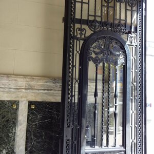 National Archaeological Museum, Madrid: (Madrid, Barrio de Salamanca) Spain, antique metal entrance door.