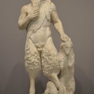 Small statue marble of Pan (Fanus), god of the wild, shepherds and flocks and follower of Dionysus, from Lappa (Argyroupoli), 2nd century AD, Heraklion Archaeological Mus. Экспонат из собрания: Археологический музей Ираклиона.