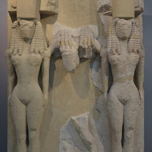Large relief plaque of poros stone depicting naked Goddesses wearing the polos crown, from the Archaic Temple of Athena in Gortyn, mid-7th century BC, Heraklion Archaeolo. Экспонат из собрания: Археологический музей Ираклиона.
