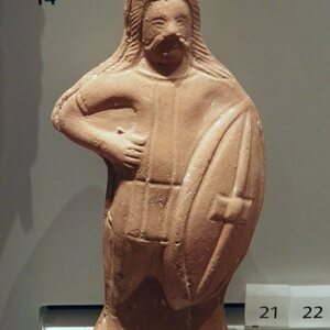 Terracotta statuette of a barbarian warrior with long hair, dropping moustache, trousers and a tunic, he carries a Celtic shield, Ashmolean Museum (8401785992). Object from the collection: Ashmolean Museum: Antiquities.