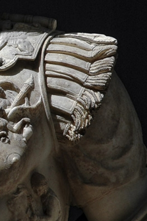 Fragments of a statue with a tunic