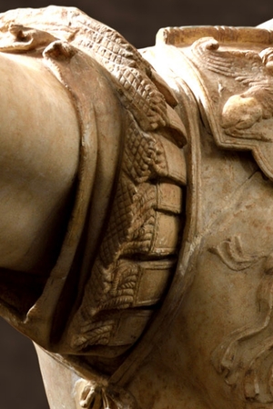 Fragments of a statue with a tunic